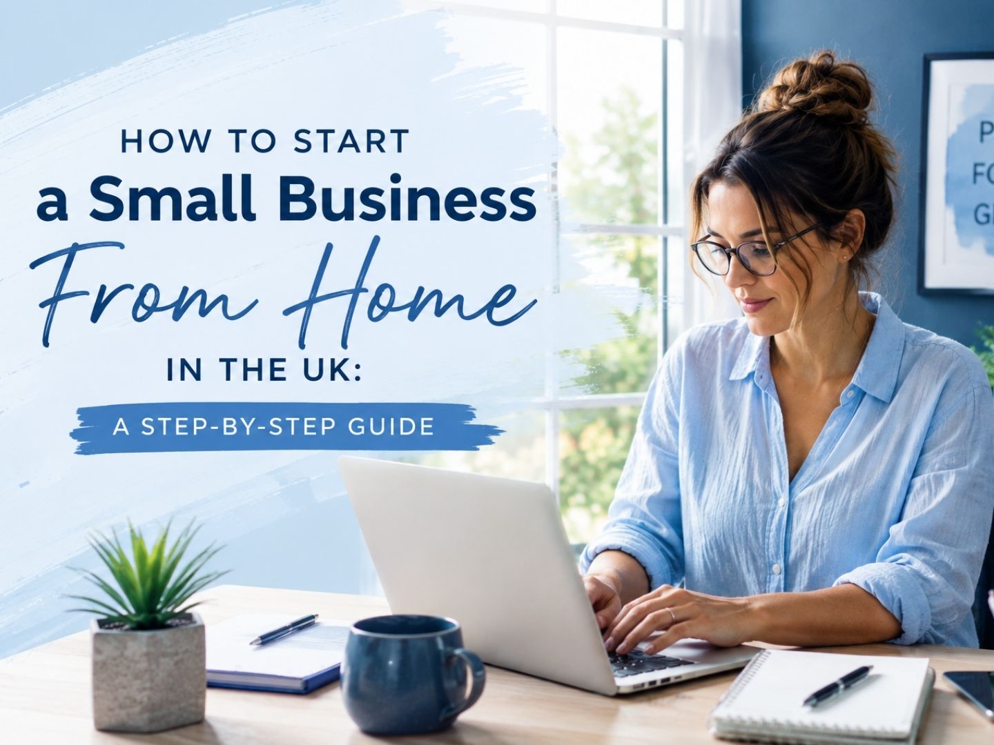 A lady with dark hair and wearing glasses, sat at her desk working at her small business from home.